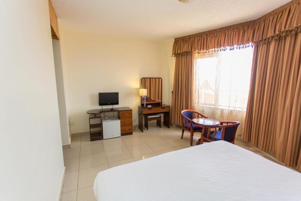 Civitas Hotel Кигали Экстерьер фото