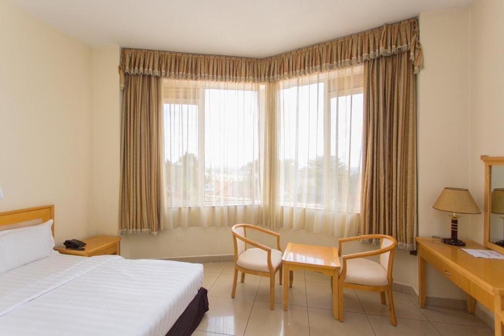 Civitas Hotel Кигали Экстерьер фото